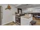 Updated kitchen with stainless appliances and stone countertops flowing into the living area at 1611 Garfield Ave # 2, Louisville, CO 80027