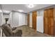 Cozy living area with wood cabinets, closet, and lots of storage at 1611 Garfield Ave # 2, Louisville, CO 80027