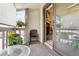 Inviting patio space with views and access to living area at 7780 W 87Th Dr # E, Arvada, CO 80005