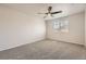 Bedroom with carpeted floor, neutral wall color and a ceiling fan at 10037 Idalia St, Commerce City, CO 80022