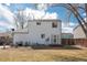 Spacious backyard with a large lawn and patio area, perfect for outdoor entertaining and relaxation at 1277 W 135Th Pl, Broomfield, CO 80234