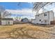 Large backyard with a shed, ample space for activities, and a fenced perimeter for privacy at 1277 W 135Th Pl, Broomfield, CO 80234