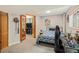 Spacious bedroom with an office area, natural light, and easy access to the adjacent living space at 1277 W 135Th Pl, Broomfield, CO 80234