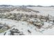 Aerial view of houses in a snow covered neighborhood at 9557 Juniper Way, Arvada, CO 80007