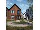 Charming modern home featuring a beautiful lawn and a seating area in front at 5744 W 92Nd Ave, Westminster, CO 80031