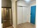 Updated entryway with new flooring and a bright blue door at 320 S Ames St # 5, Lakewood, CO 80226