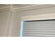 Close-up of window with white blinds and trim at 320 S Ames St # 5, Lakewood, CO 80226