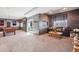 Finished basement with pool table, living area, and walkout to patio and backyard at 8131 S Coolidge Way, Aurora, CO 80016