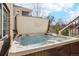 Private hot tub on the patio with seating, perfect for relaxing and enjoying the outdoors at 8131 S Coolidge Way, Aurora, CO 80016