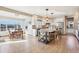 Open concept kitchen featuring a center island with bar stool seating and stainless steel appliances at 8131 S Coolidge Way, Aurora, CO 80016