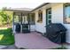 Outdoor patio area features a grill and access to the home's interior, perfect for entertaining at 2125 Rangeview Ln, Longmont, CO 80501