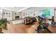 Spacious basement features a brick fireplace and an open area for a home gym or study at 2125 Rangeview Ln, Longmont, CO 80501