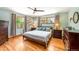 Bright bedroom features hardwood floors, natural light, and ample space for relaxation at 2125 Rangeview Ln, Longmont, CO 80501