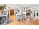The kitchen offers custom cabinets, quartz countertops, and stainless steel appliances at 2125 Rangeview Ln, Longmont, CO 80501