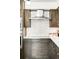 Modern kitchen with stainless steel appliances and elegant custom cabinetry at 1551 Larimer St # 1405, Denver, CO 80202