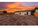 Backyard at dusk featuring new fence, providing privacy and a secure space for outdoor living at 5304 Granby St, Denver, CO 80239