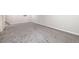 Finished basement with neutral carpet and walls; bonus living space at 5304 Granby St, Denver, CO 80239