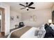 Bedroom featuring neutral decor and a ceiling fan at 5304 Granby St, Denver, CO 80239