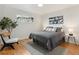 Comfortable bedroom with hardwood floors, natural light, and modern decor at 3377 N Krameria St, Denver, CO 80207