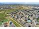 Charming townhome community with a pool, playground and well-maintained landscaping from an aerial view at 16212 E Geddes Ln # 11, Aurora, CO 80016