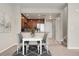 Inviting dining area adjacent to the kitchen, perfect for gatherings, with a clear view into the kitchen at 16212 E Geddes Ln # 11, Aurora, CO 80016