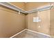 Walk-in closet featuring built-in shelving and ample storage space at 16212 E Geddes Ln # 11, Aurora, CO 80016