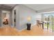 Second story hallway featuring hardwood floors with a view of the living room below at 10293 E Sheri Ln, Englewood, CO 80111