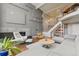 Stylish living room with a modern fireplace, high ceilings, and comfortable seating arrangement at 10293 E Sheri Ln, Englewood, CO 80111