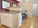 Kitchen nook with breakfast bar and view to the dining area at 1659 Harris St, Superior, CO 80027