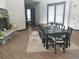 Spacious dining area featuring fireplace, large windows, and seating for ten at 1659 Harris St, Superior, CO 80027