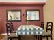 The formal dining area boasts mirrors, creating an elegant space for meals and gatherings at 1659 Harris St, Superior, CO 80027