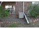 Brick home featuring an air conditioning unit and well-maintained surroundings at 1659 Harris St, Superior, CO 80027