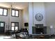 Relaxing lounge area with high ceilings, large fireplace and cozy furniture at 1659 Harris St, Superior, CO 80027