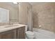 Bright bathroom features a vanity with a white countertop, tile floors, a bathtub and shower at 3255 Waterfront Dr, Monument, CO 80132