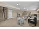 Spacious living room with carpet, modern furniture and decor at 3255 Waterfront Dr, Monument, CO 80132