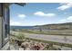 Picturesque view of the lake and surrounding landscape from this property at 3255 Waterfront Dr, Monument, CO 80132