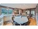 Bright kitchen featuring an island cooktop, stainless steel appliances, and a breakfast nook at 8216 S Krameria Way, Centennial, CO 80112