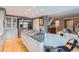 Spacious kitchen with an island range, stainless steel appliances, and hardwood flooring at 8216 S Krameria Way, Centennial, CO 80112