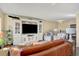 Inviting living room features a large built-in entertainment center and comfortable seating area at 7040 E Girard Ave # 406, Denver, CO 80224