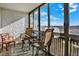 Enclosed patio area with comfortable seating, perfect for enjoying the outdoors at 7040 E Girard Ave # 406, Denver, CO 80224
