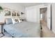 This bedroom features carpet flooring and a large closet at 6459 N Dunkirk St, Denver, CO 80249