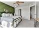 Relax in this bedroom featuring neutral carpet and natural light at 6459 N Dunkirk St, Denver, CO 80249