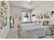 This bedroom features a large bed and decorative art at 6459 N Dunkirk St, Denver, CO 80249