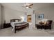 A bedroom features a comfortable bed and access to a convenient storage area at 10524 Serengeti Dr, Lone Tree, CO 80124