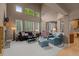 Spacious living room with large windows and hardwood floors at 10524 Serengeti Dr, Lone Tree, CO 80124