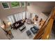 A living room showcases abundant natural light, neutral tones, and comfortable seating arrangement at 10524 Serengeti Dr, Lone Tree, CO 80124