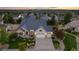Aerial view of home with landscaped yard, three car garage, and neighborhood at 27235 E Lakeview Pl, Aurora, CO 80016