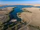 Beautiful aerial view of the lake and surrounding open spaces, with walking path at 27235 E Lakeview Pl, Aurora, CO 80016