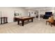 Finished basement featuring a pool table and entertainment area at 27235 E Lakeview Pl, Aurora, CO 80016