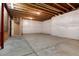 Unfinished basement with concrete floors and exposed ceiling, ready for customization at 27235 E Lakeview Pl, Aurora, CO 80016
